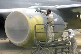 AcraStrip 600 Military workers wearing protective gear while applying AcraStrip 600 Military to a very large section of a plane